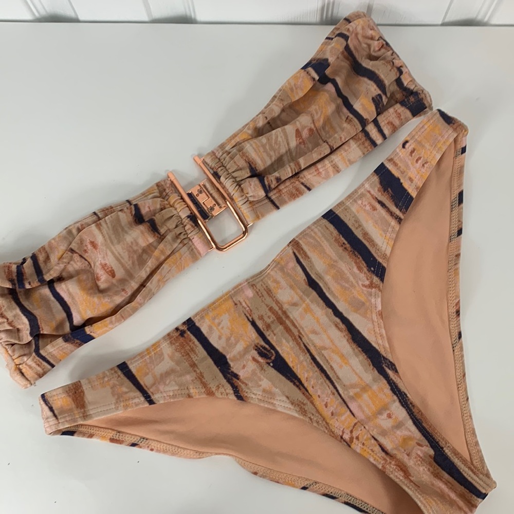 H&M 2 pc. Bikini earth tones. Top is a band with Rosegold metal piece,